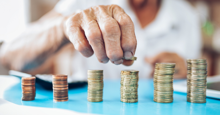 a man counting coins in a retirement community